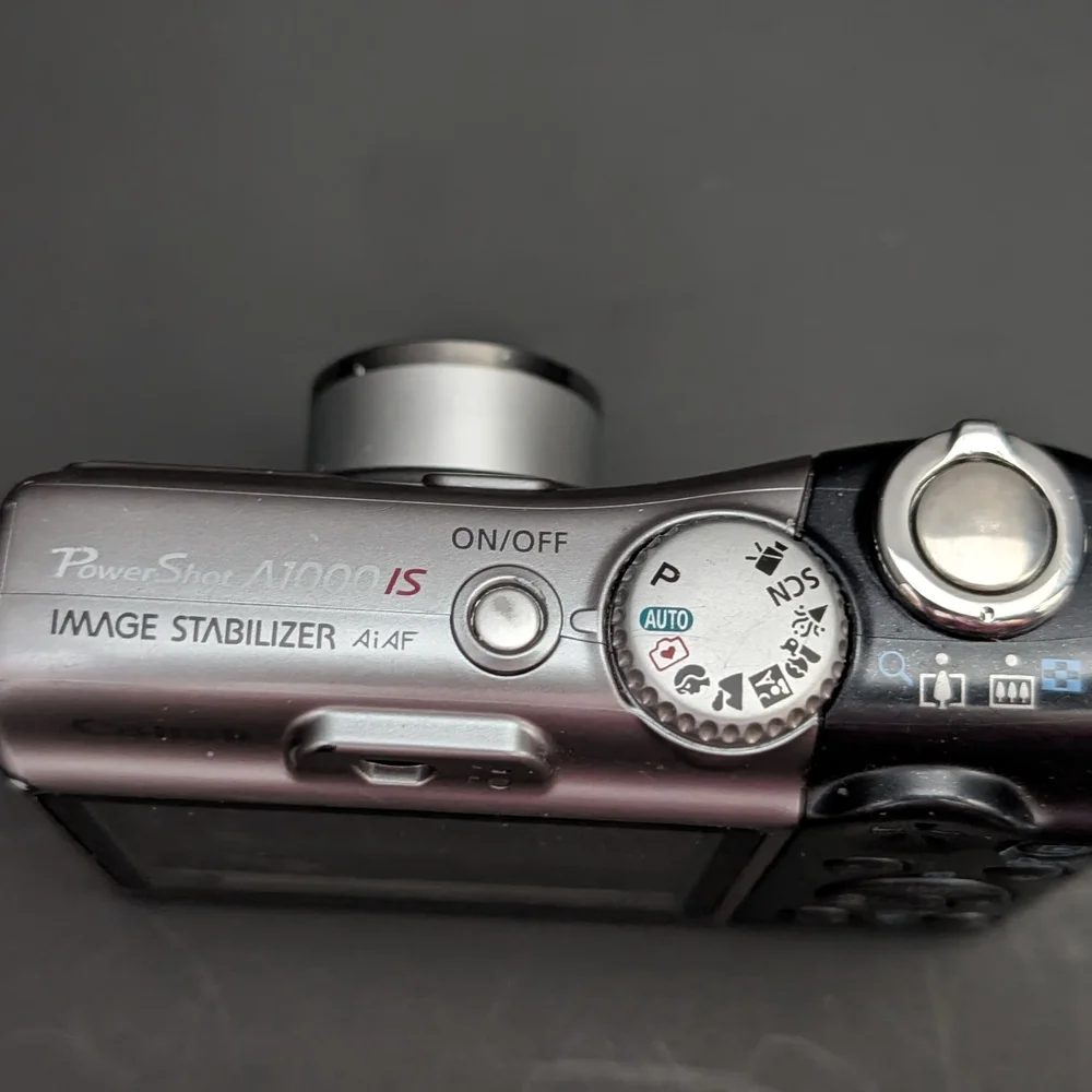 Canon PowerShot A1000 IS PC1309 10 MP optical zoom camera FOR PARTS ONLY 22026D4